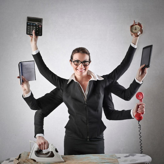 Effective multitasking is a myth. Woman juggling 6 activities at once